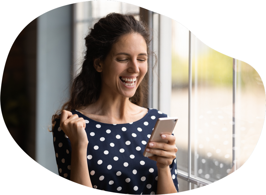 Woman-Excited-on-Cell-Phone-Mortgage-Offer-2